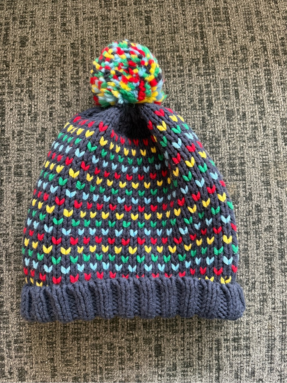 Hanna Andersson Navy Knit Pom Hat with Red, Yellow, Teal, and Green Accents